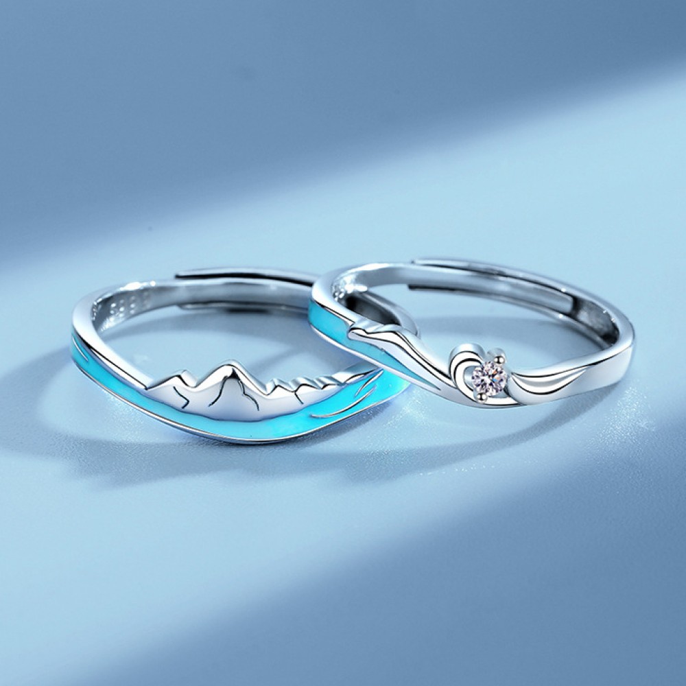 Sharon's palladium topaz and diamond ocean inspired engagement ring